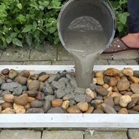 إبداع فرید لفنان صینی فی صنع المزهریات من الأسمنت والحصى + فیدیو