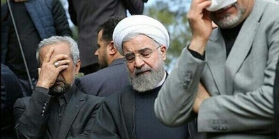 اللحظه المؤثره لحسن روحانی وهو یصلی على جثمان أخته + صور / وداع الأخ لأخته