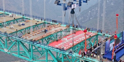 تحفه صینیه معماریه! أطول جسر فی العالم یفتح أبوابه الآن… مع مقهى فی القمه! +فیدیو