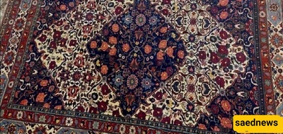 سجاده إیرانیه یدویه الصنع تباع فی مزاد بغداد للتحف