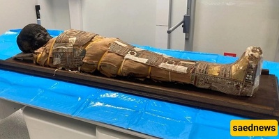اکتشاف جسم مجهول على صدر مومیاء طفل مصری عمره 2000 عام