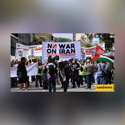 الأمریکیون ینزلون إلى الشوارع دعماً لإیران؛ صدى هتافات "ارفعوا أیدیکم عن إیران" و "ترامب مجرم حرب" یتردد فی المدن الأمریکیه الکبرى + فیدیو