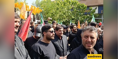 دموع مخبر تحتضن نجل الشهید حاجی‌زاده: لحظه مؤثره تهزّ مشاعر الإیرانیین + فیدیو