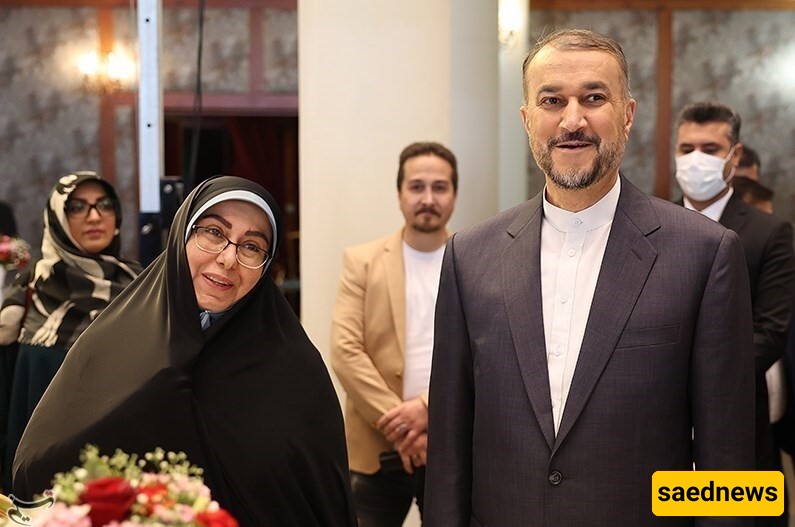 لنقلب صفحات التاریخ: غبار الحزن والفراق یکسو وجه زوجه وابن الشهید أمیر عبد اللهیان فی مؤتمر دولی + صور
