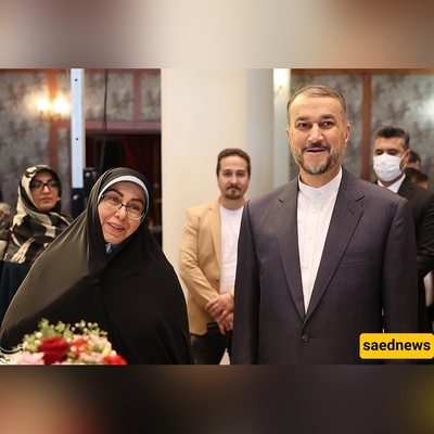 لنقلب صفحات التاریخ: غبار الحزن والفراق یکسو وجه زوجه وابن الشهید أمیر عبد اللهیان فی مؤتمر دولی + صور