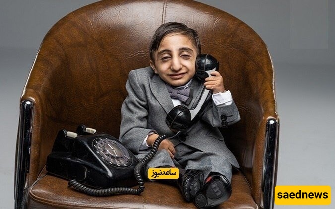 "رجل إیرانی بأصغر یدیْن فی العالم یحطم رقمًا قیاسیًا فی موسوعه غینیس! +صور"