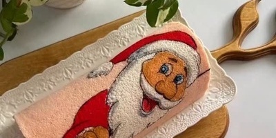 إبداع مذهل للفنان قنّاد فی صنع کعکه رول سانتا کلوز الممیزه