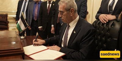 رئیس اللجنه الوطنیه الفلسطینیه لإداره غزه یوقع بیان مهمه اللجنه الوطنیه لإداره غزه