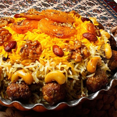 طبق من قلب الأهواز أصبح حدیث عشاق المطبخ الإیرانی... هل جرّبت خرما بلو؟
