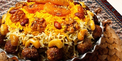 طبق من قلب الأهواز أصبح حدیث عشاق المطبخ الإیرانی... هل جرّبت خرما بلو؟