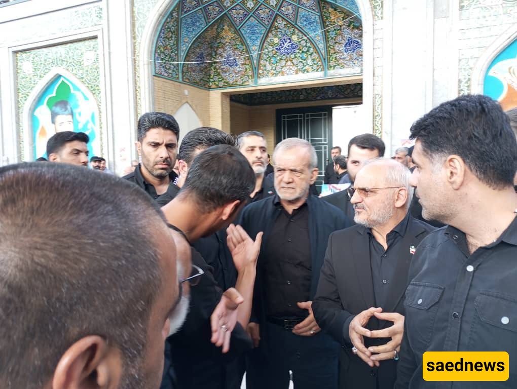 ازدحام المصوّرین یعیق خروج مسعود پزشکیان من مراسم تأبین شهداء مقرّ خاتم الأنبیاء + فیدیو