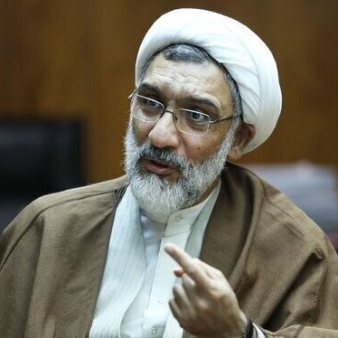صوره لم تُرَ من قبل لاجتماع ومفاوضه مصطفى بورمحمدی وصدام حسین!