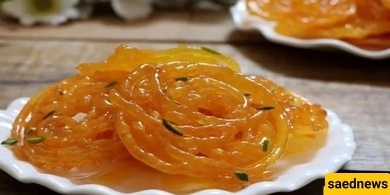 کیفیه تحضیر الزولبیا المقرمشه واللذیذه فی المنزل باستخدام النشاء، مثالیه لشهر رمضان + فیدیو