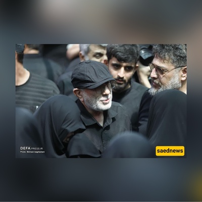 قاآنی یواسی عائله الشهید حاجی‌زاده عند قبره... قبله أبویه على جبین الابن تهزّ المشاعر +فیدیو